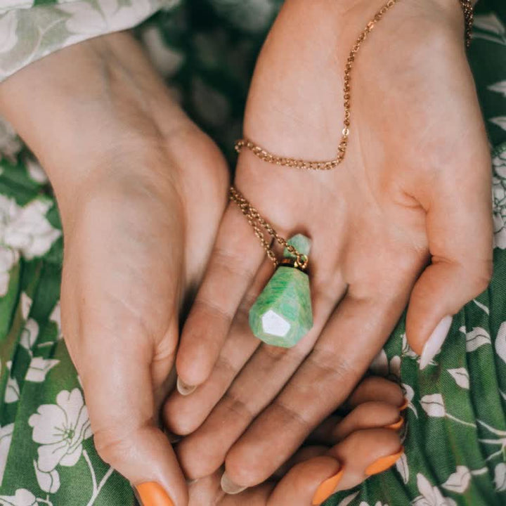 Elegant natural crystal perfume bottle necklace, a lovely accessory for her.