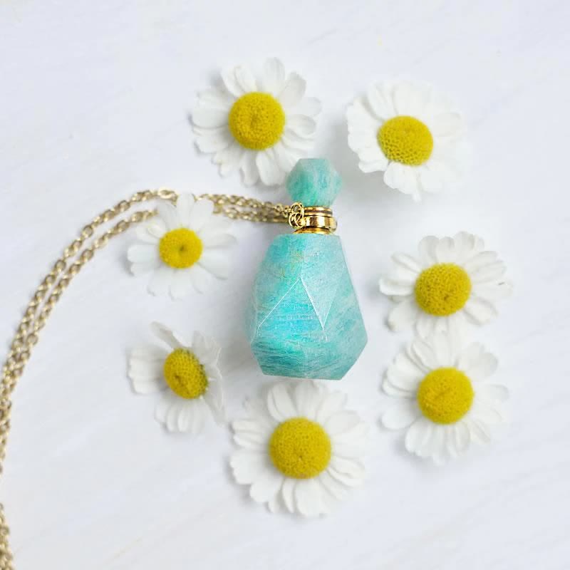 Perfume bottle crystal necklace for women, a unique way to wear essential oils daily.