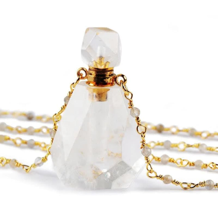 Handcrafted crystal perfume bottle necklace, perfect for aromatherapy on the go.
