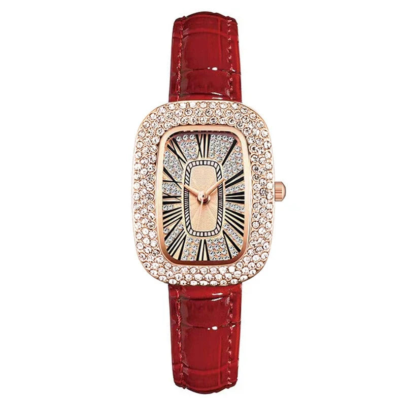 Modern elegant women's crystal watch, rose gold finish, rectangular dial, and leather strap.