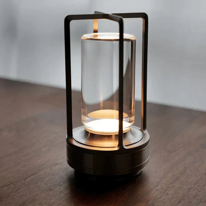 Rechargeable LED crystal bedside lamp, offering ambient light & touch control for modern home decor.