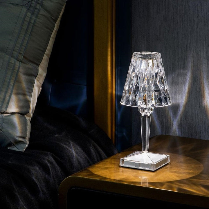 Rechargeable crystal table lamp with touch control, providing atmospheric LED lighting.