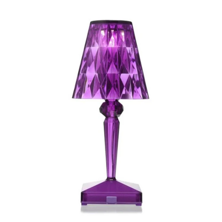 Modern crystal table lamp with elegant design, enhancing home decor.