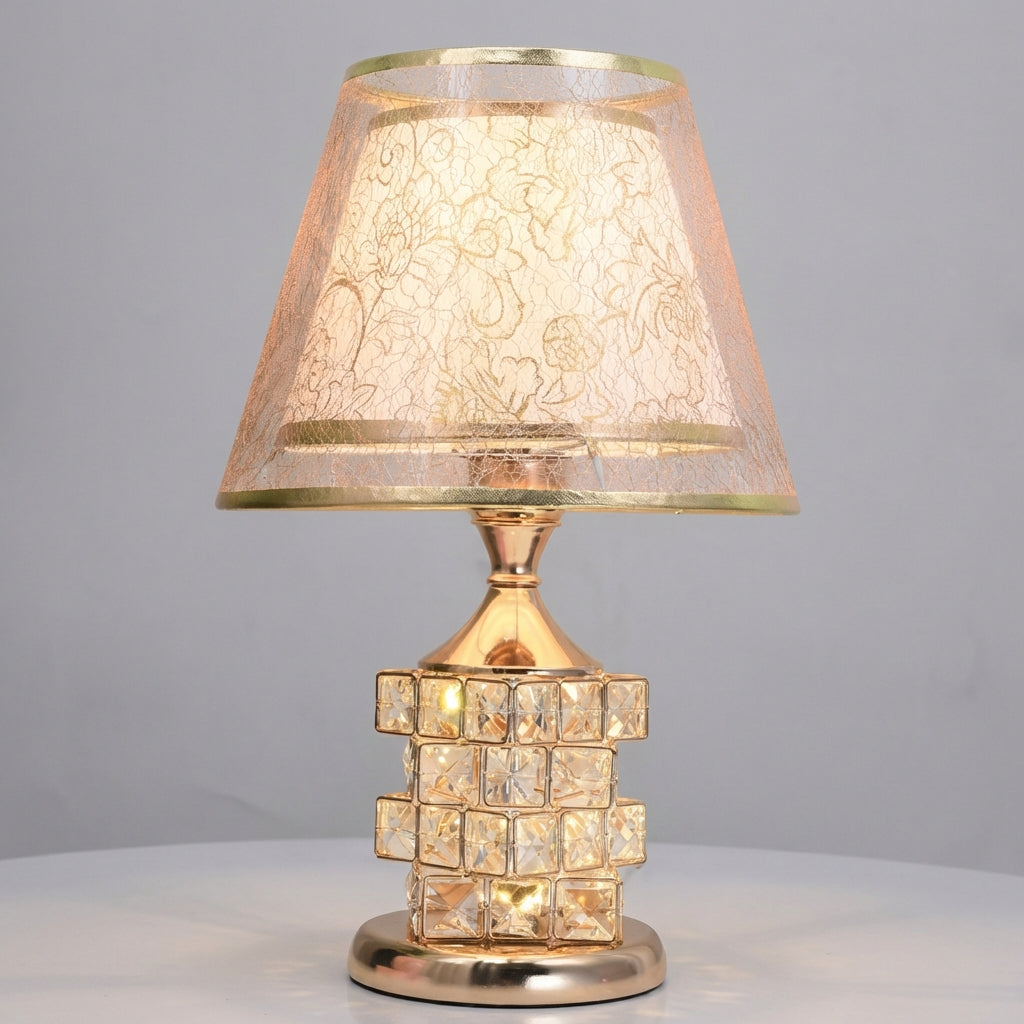 Crystal accent table lamp illuminating a cozy living room, enhancing the home's ambiance.