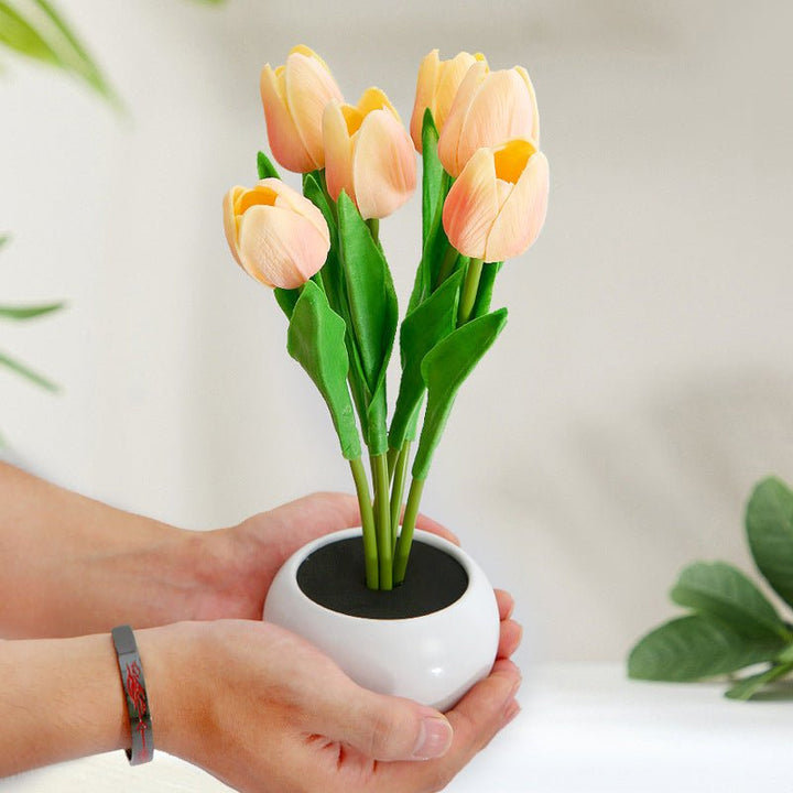 Battery operated LED tulip lamp, offering portable and versatile decorative lighting for any room or special occasion.