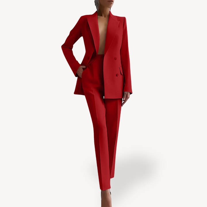Versatile women's double-breasted suit, featuring a structured blazer and comfortable tailored trousers.