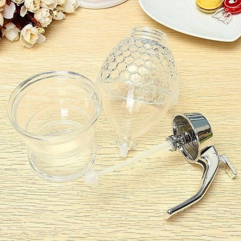 Modern honey pot dispenser for breakfast table, perfect for serving syrup, sugar, or sauces elegantly.
