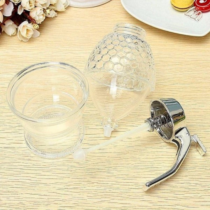 Modern honey pot dispenser for breakfast table, perfect for serving syrup, sugar, or sauces elegantly.