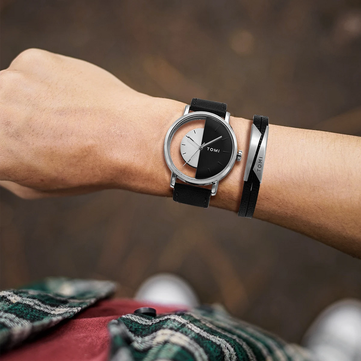 Unisex Eclipse watch set featuring a brown leather strap & elegant black dial. Modern accessory.