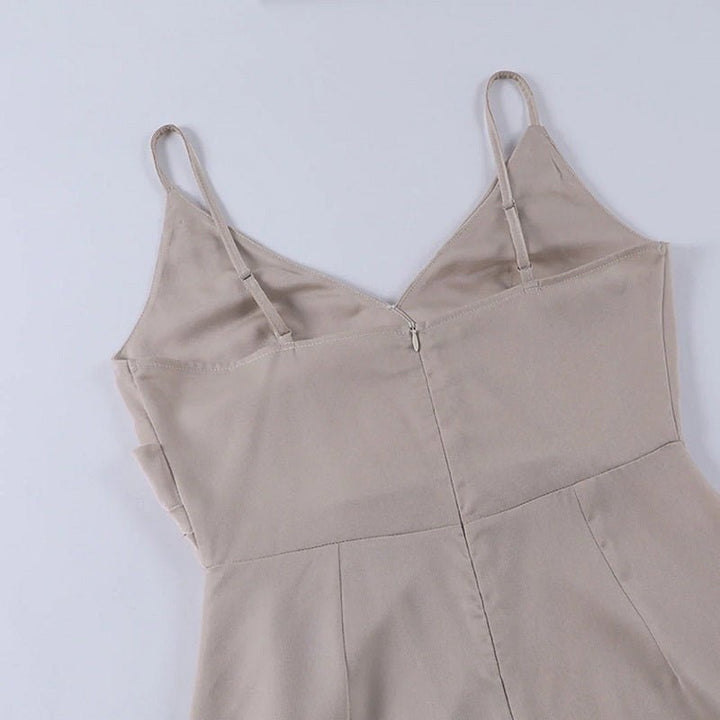 Chic Elara long dress for women, a stylish V-neck gown with a modern slit, great for parties.