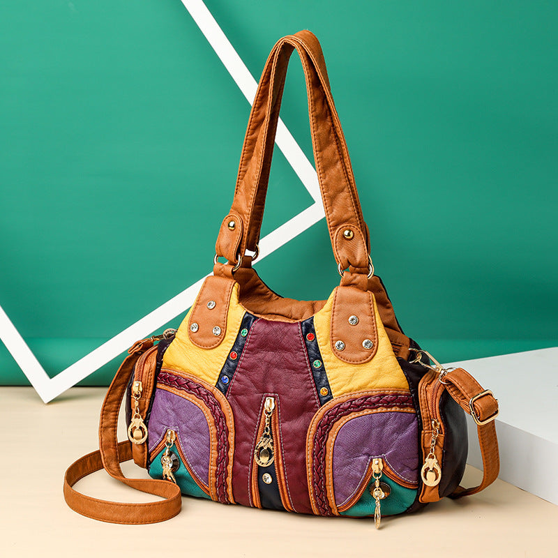 Versatile women's elegant faux leather shoulder & crossbody bag, a stylish and organized handbag.