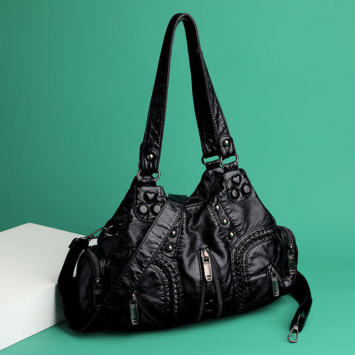 Fashionable women's faux leather shoulder bag, elegant, durable, and a versatile crossbody option.