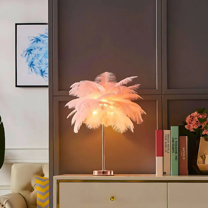 Close-up of fluffy white feathers on a decorative palm tree lamp, ambient home decor.
