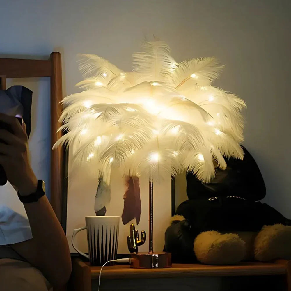 Two feather palm tree lamps as a pair, creating symmetrical decorative lighting.