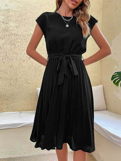 Stylish Felina women's short sleeve pleated mini dress, an elegant and trendy choice for versatile fashion.