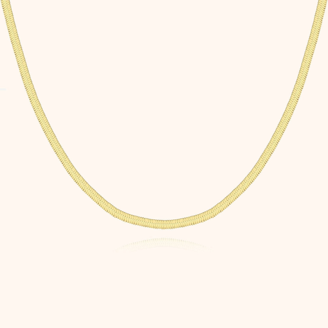Elegant flat chain necklace for women, perfect for versatile styling, a key piece of jewelry.