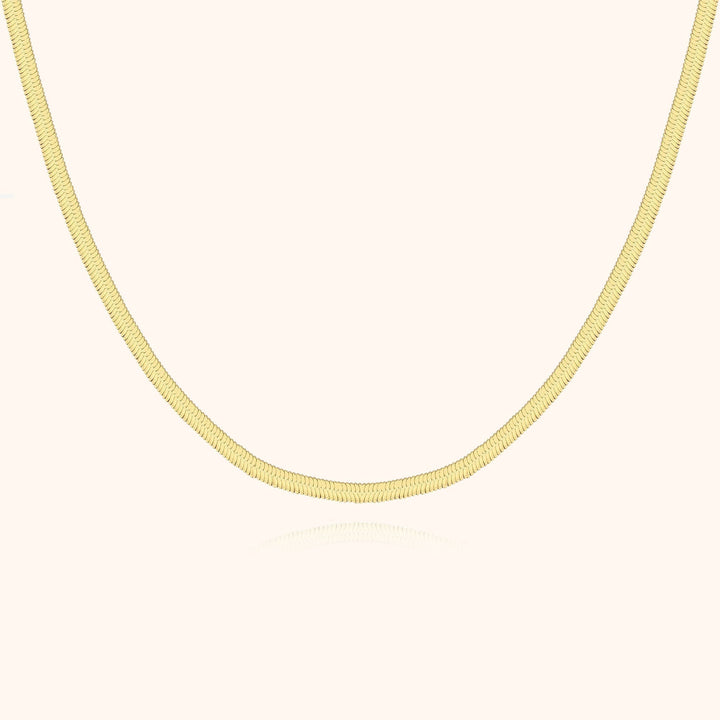 Elegant flat chain necklace for women, perfect for versatile styling, a key piece of jewelry.