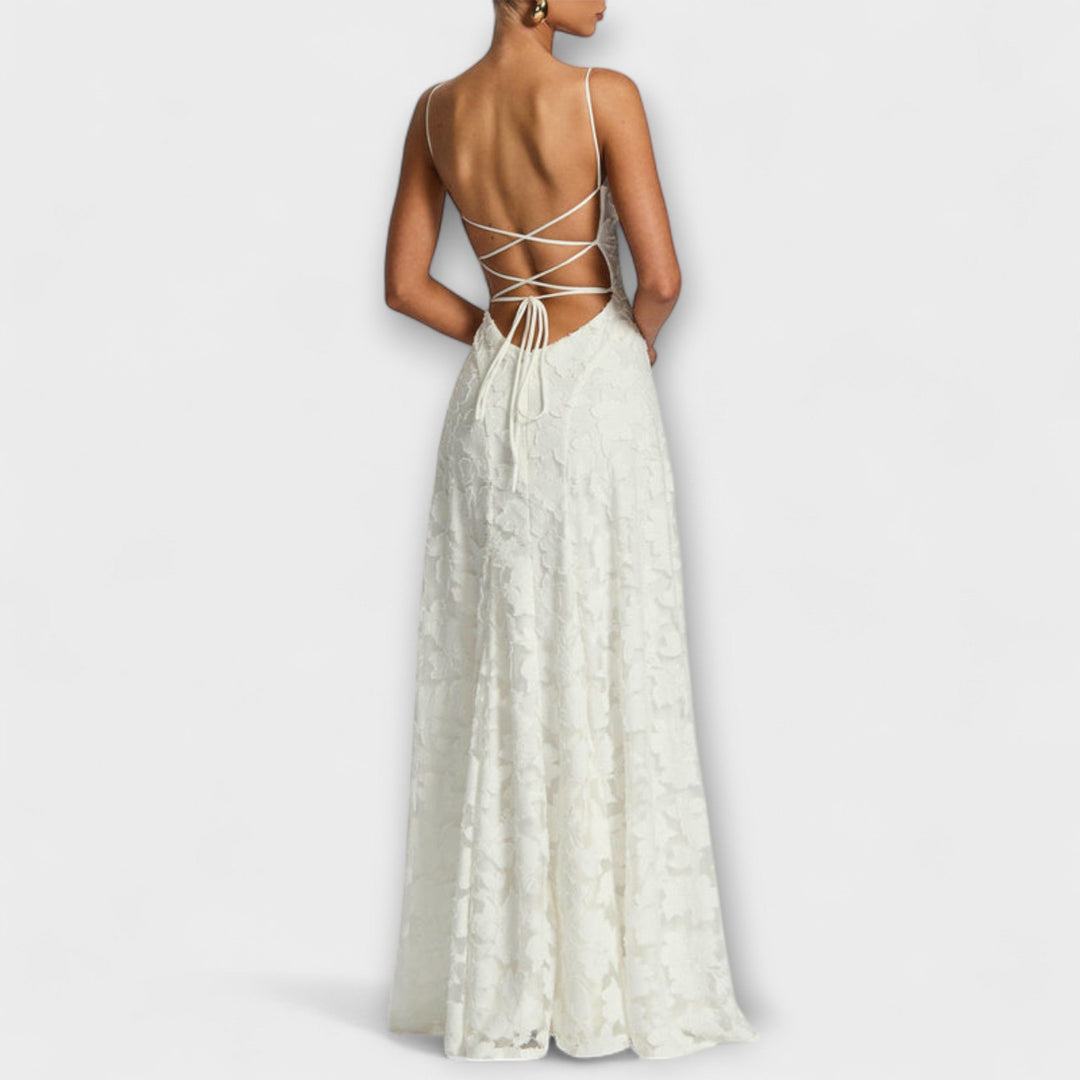 Women's A-line floral lace maxi dress, intricate design for elegant party wear or wedding guest attire.