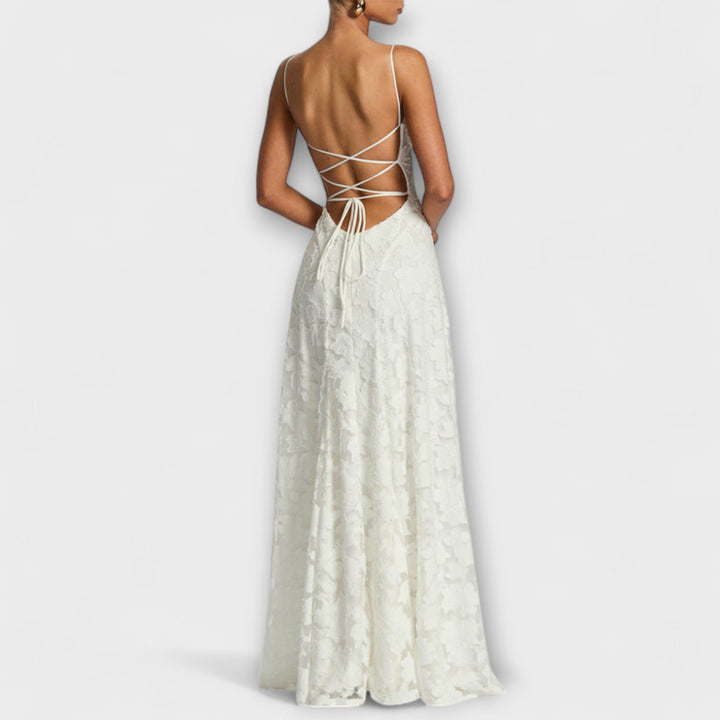 Women's A-line floral lace maxi dress, intricate design for elegant party wear or wedding guest attire.