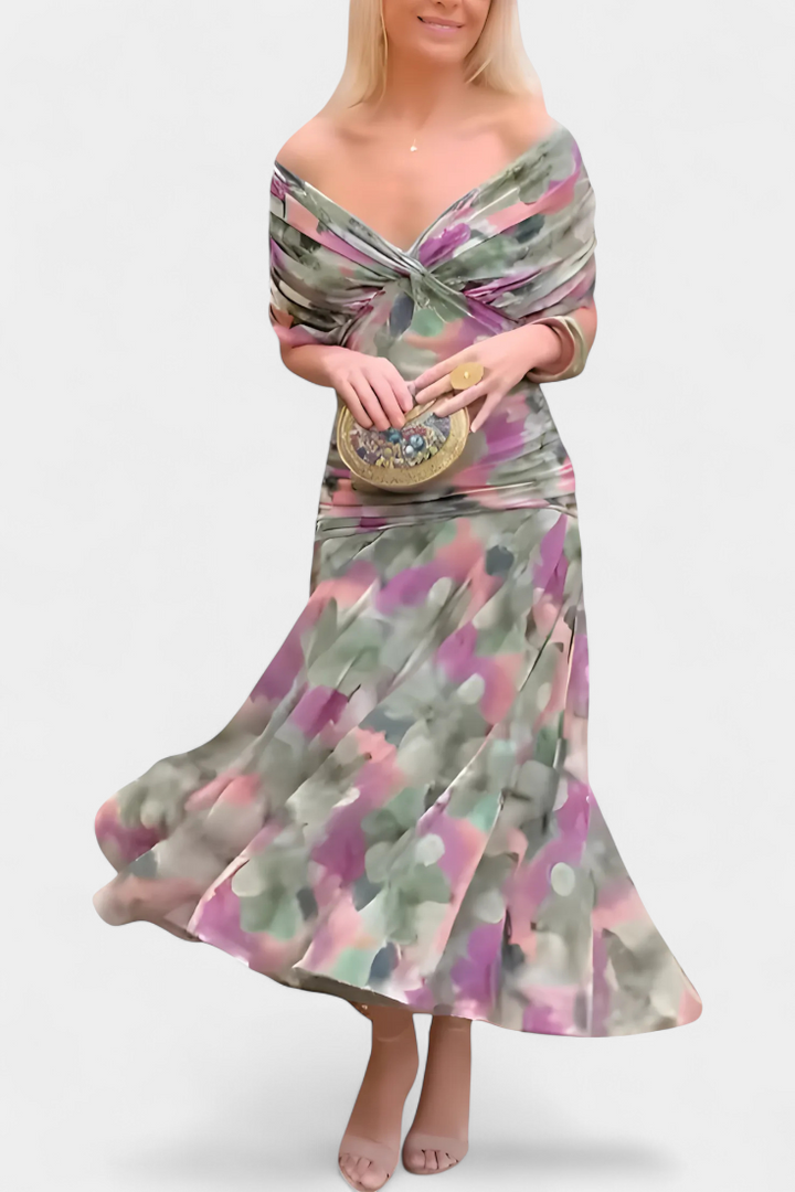 Elegant V-neck floral maxi dress for women, featuring a vibrant pattern & flowy fabric.