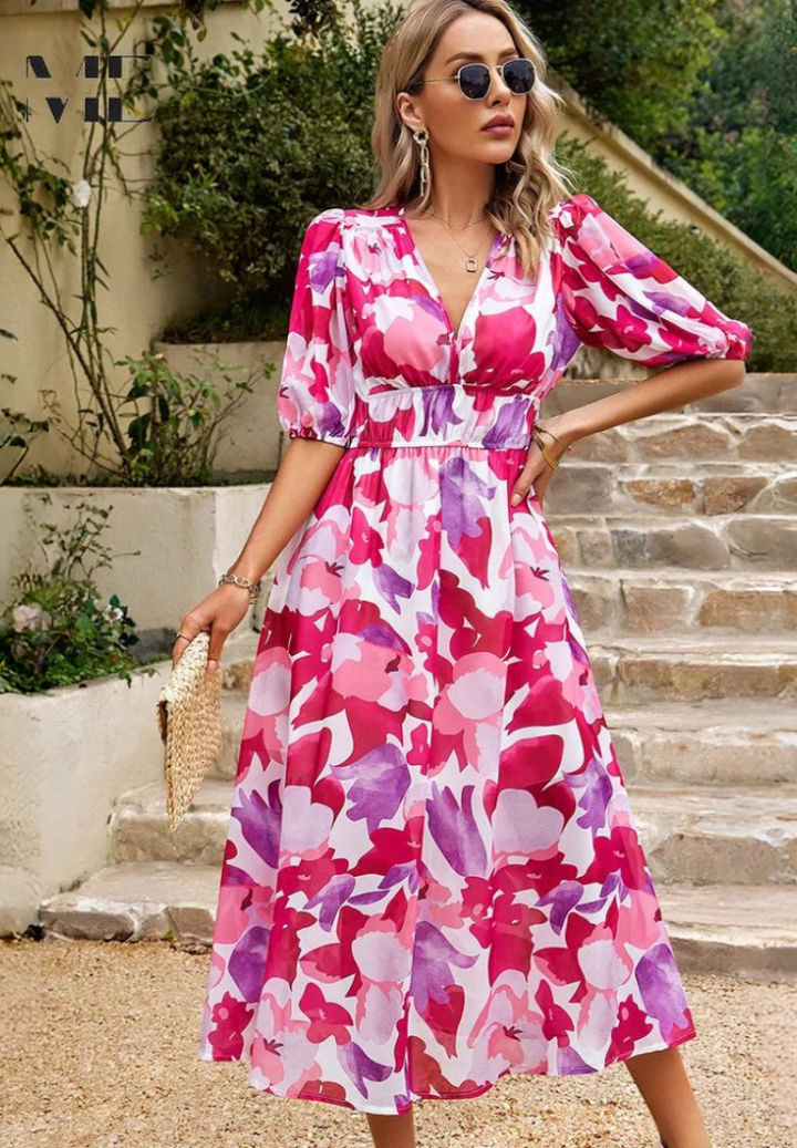 Fashionable floral midi dress, elegant puff sleeves, V-neck. Blends casual comfort with stylish A-line.
