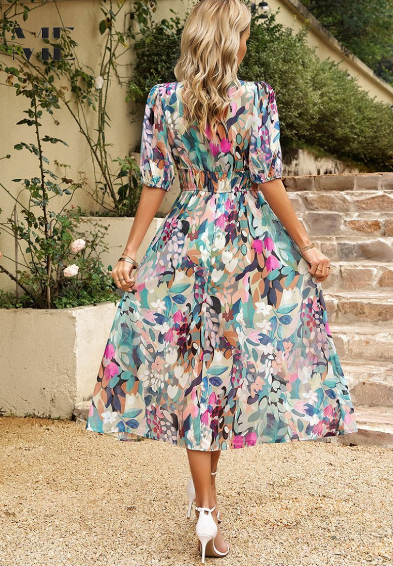 Stylish women's A-line floral midi dress featuring elegant puff sleeves. Ideal for brunch & summer.