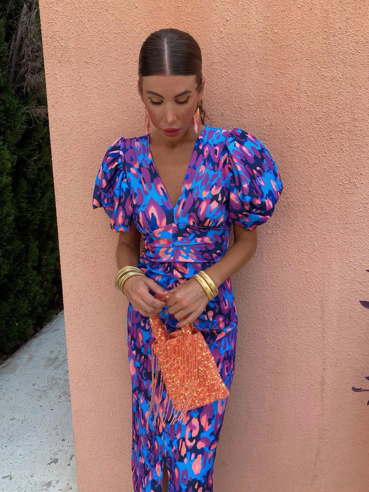 Vibrant floral print V-neck midi dress for women, featuring elegant puff sleeves, perfect for summer.