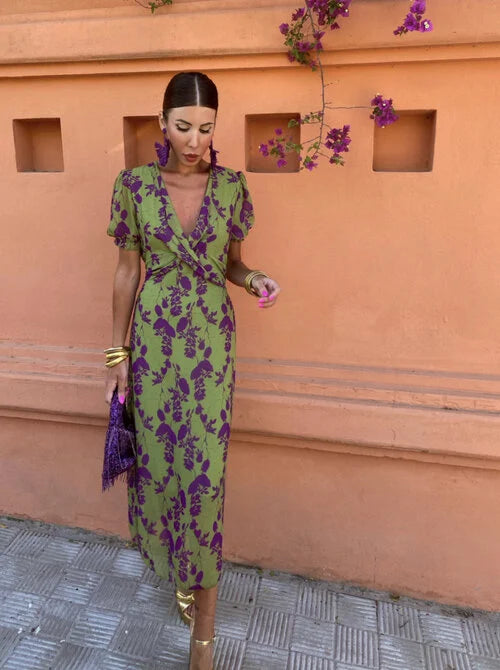 Chic floral puff sleeve midi dress for women. Elegant V-neck design, vibrant for summer parties or casual wear.