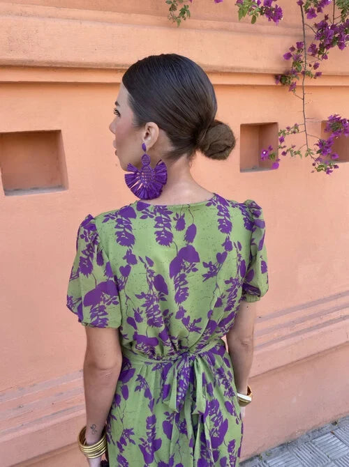 Elegant summer midi dress for women, featuring a vibrant floral print, puff sleeves & V-neck. Ideal for any occasion.