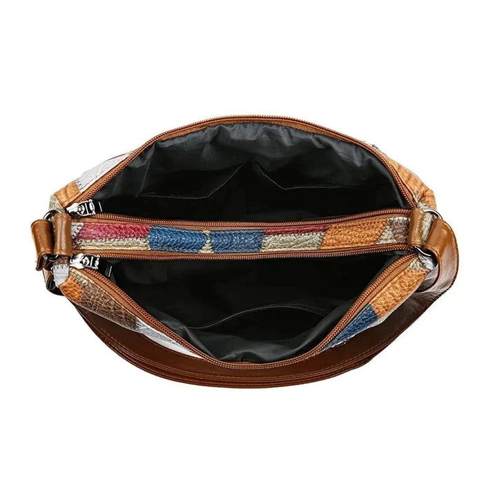 Front view: Women's elegant geometric vegan leather handbag, ideal for daily essentials.
