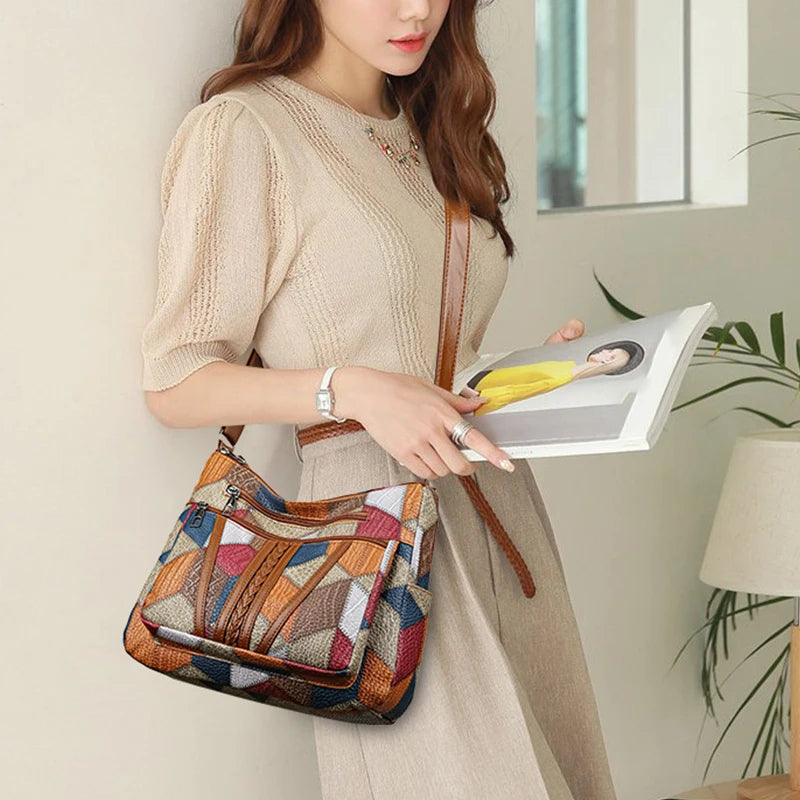 Textured geometric patchwork vegan leather handbag, showcasing a unique design for women.