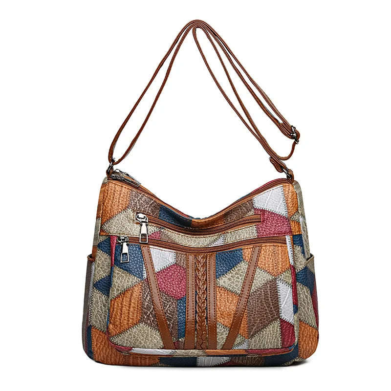 Women's stylish geometric shoulder bag, convertible to a crossbody, made of vegan leather.