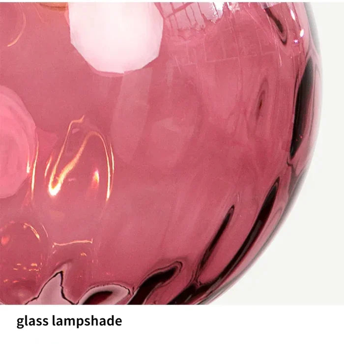 Colorful glass sphere pendant lamp, elegant modern lighting solution for any room.