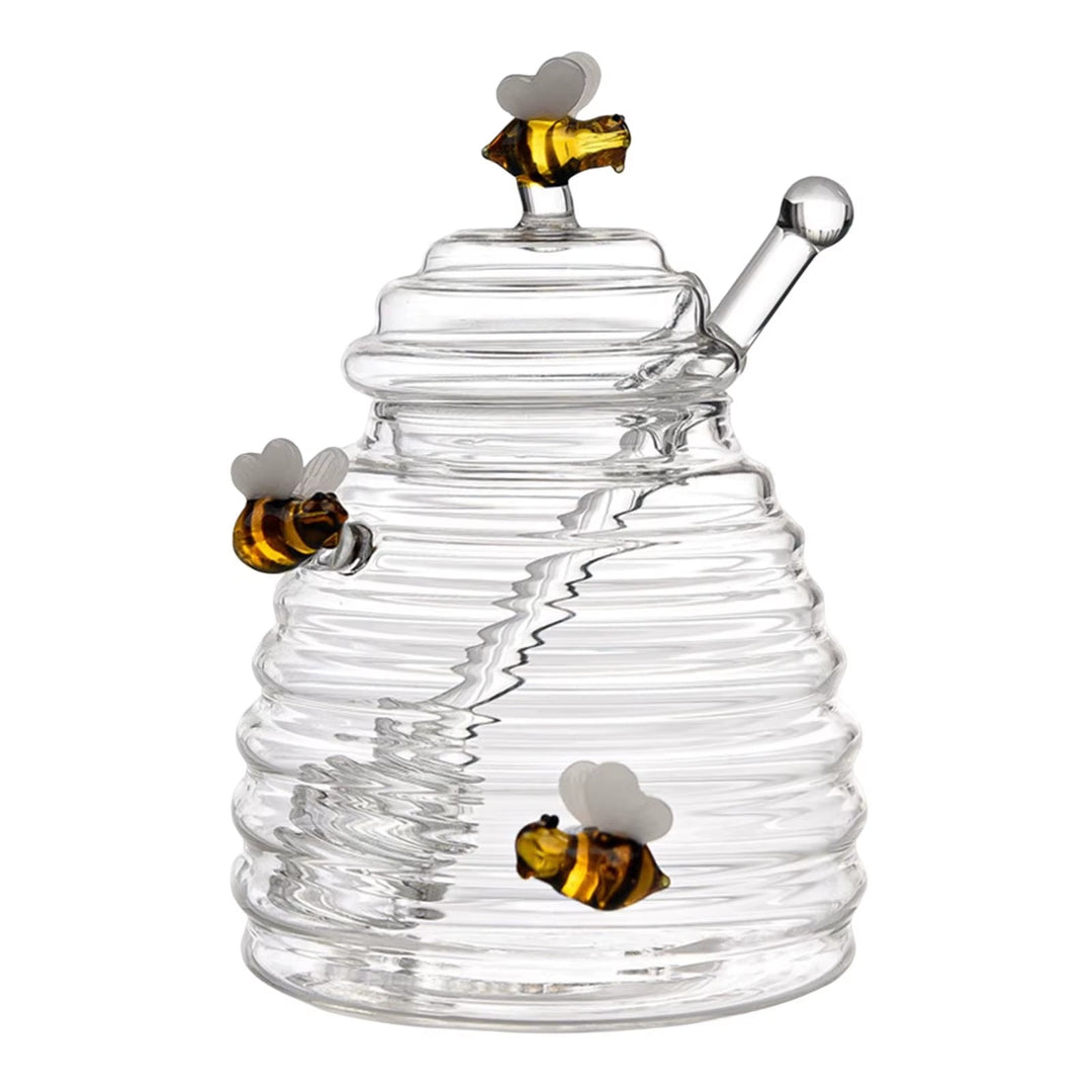 Decorative glass honey jar, elegant beehive design, includes a wood honey dipper. Great for gifts.