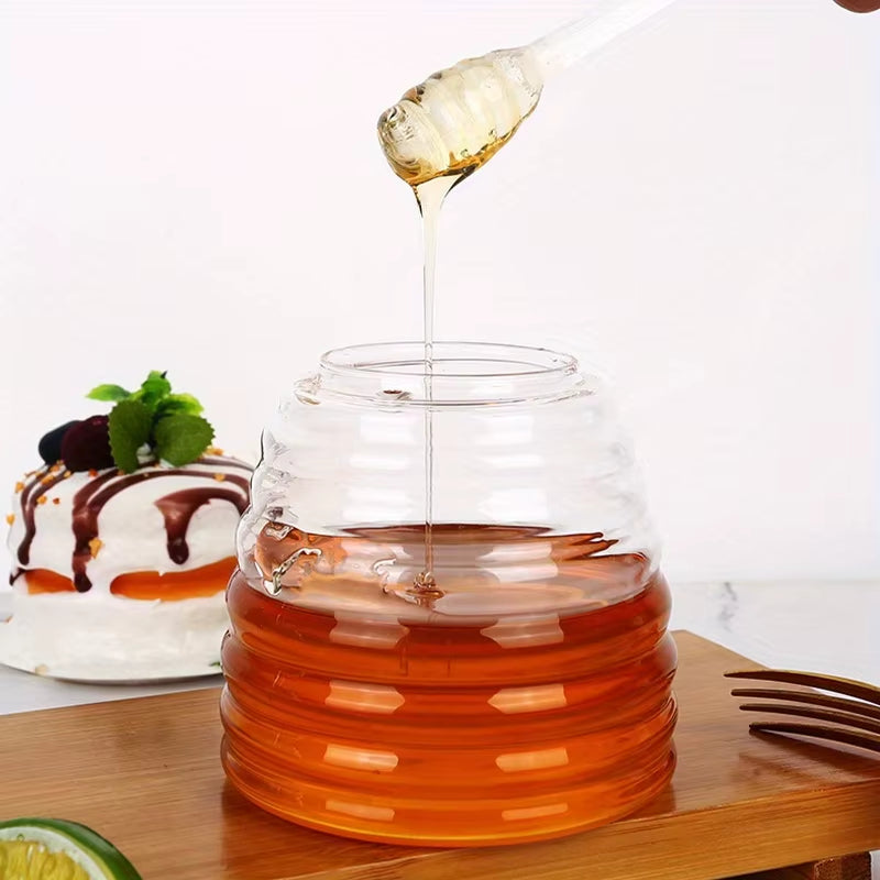 Versatile glass beehive honey dipper jar. An elegant serving ware piece for any kitchen.