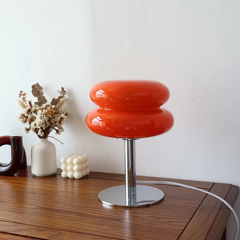 Elegant glass table lamp with ambient LED light, perfect for bedroom decor.