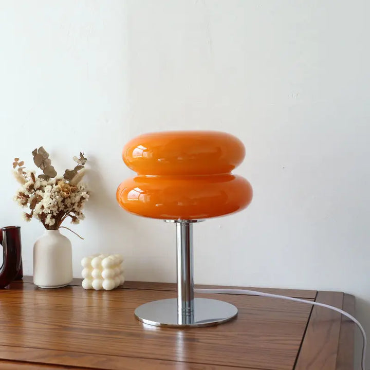 Modern design glass table lamp featuring energy-efficient LED lighting.