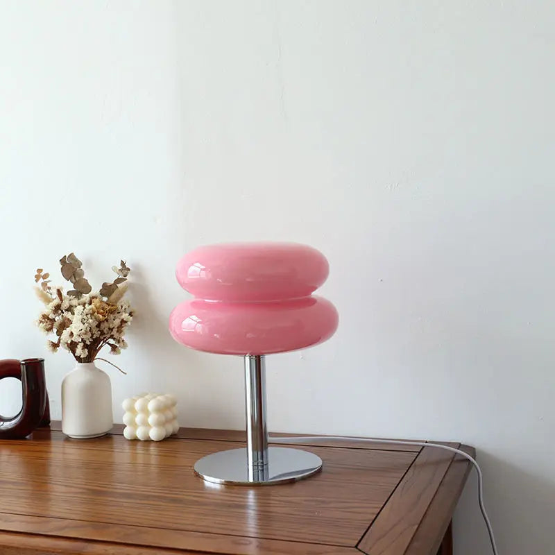 Ambient LED table lamp, clear glass construction for a contemporary look.