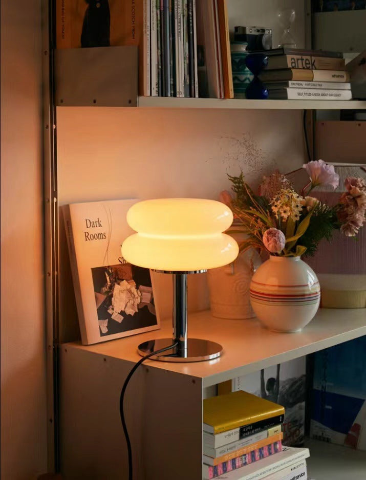 Contemporary glass table lamp, an elegant home accent for any room.
