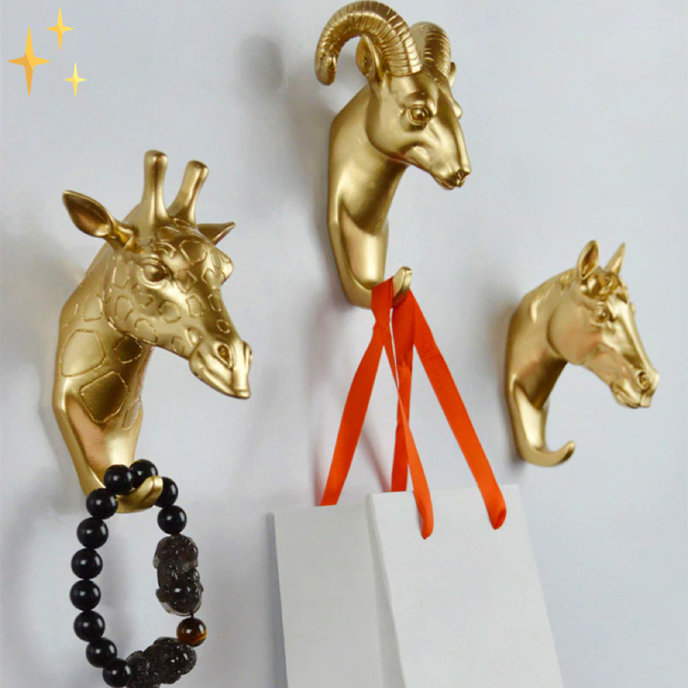 Chic gold wildlife wall hook. Elegant animal design for versatile storage and stylish home decor.