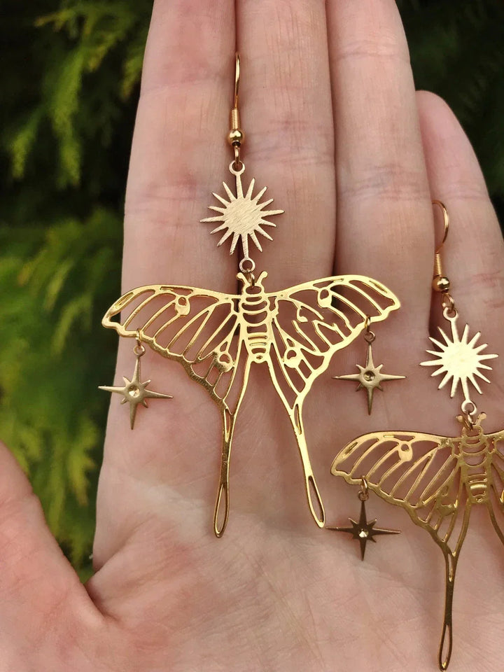 Delicate gold butterfly moth drop earrings, elegant women's fashion jewelry with a nature-inspired design.