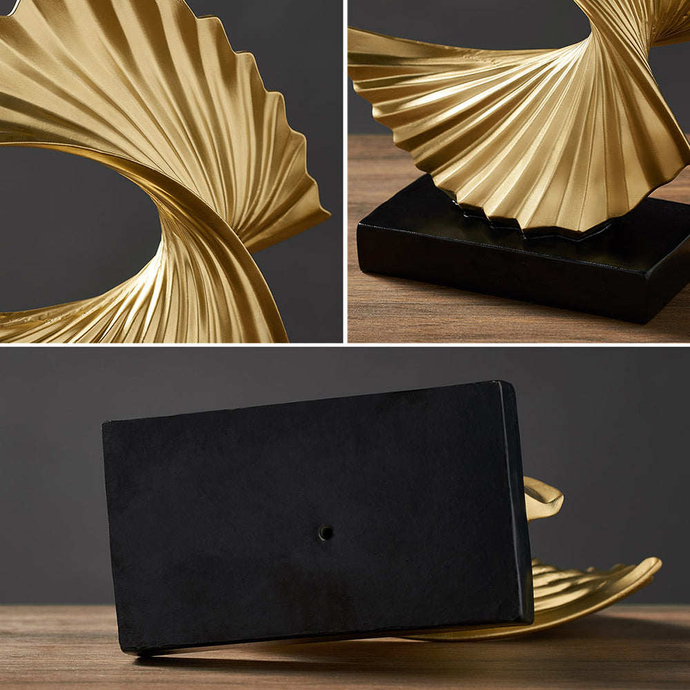 Stylish crescent moon sculpture, elegant celestial home decor in a gold & white resin finish.
