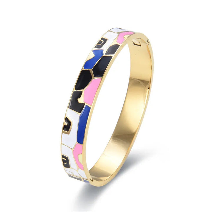 Women's exquisite gold cuff bracelet, featuring a sparkling natural geode charm.