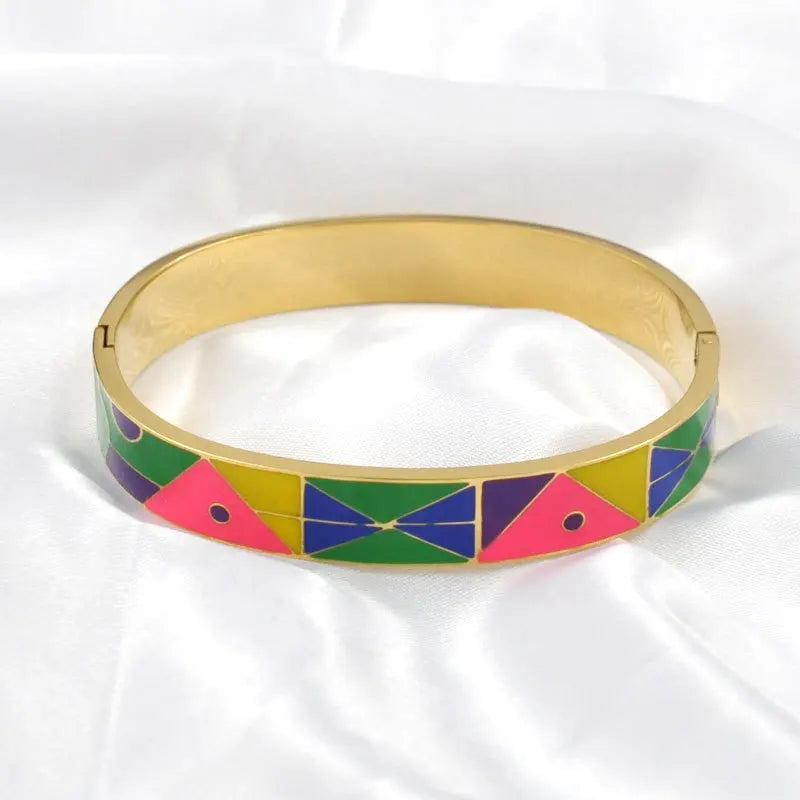 Stunning women's gold cuff bracelet with a unique geode charm, ideal for elegant wear.