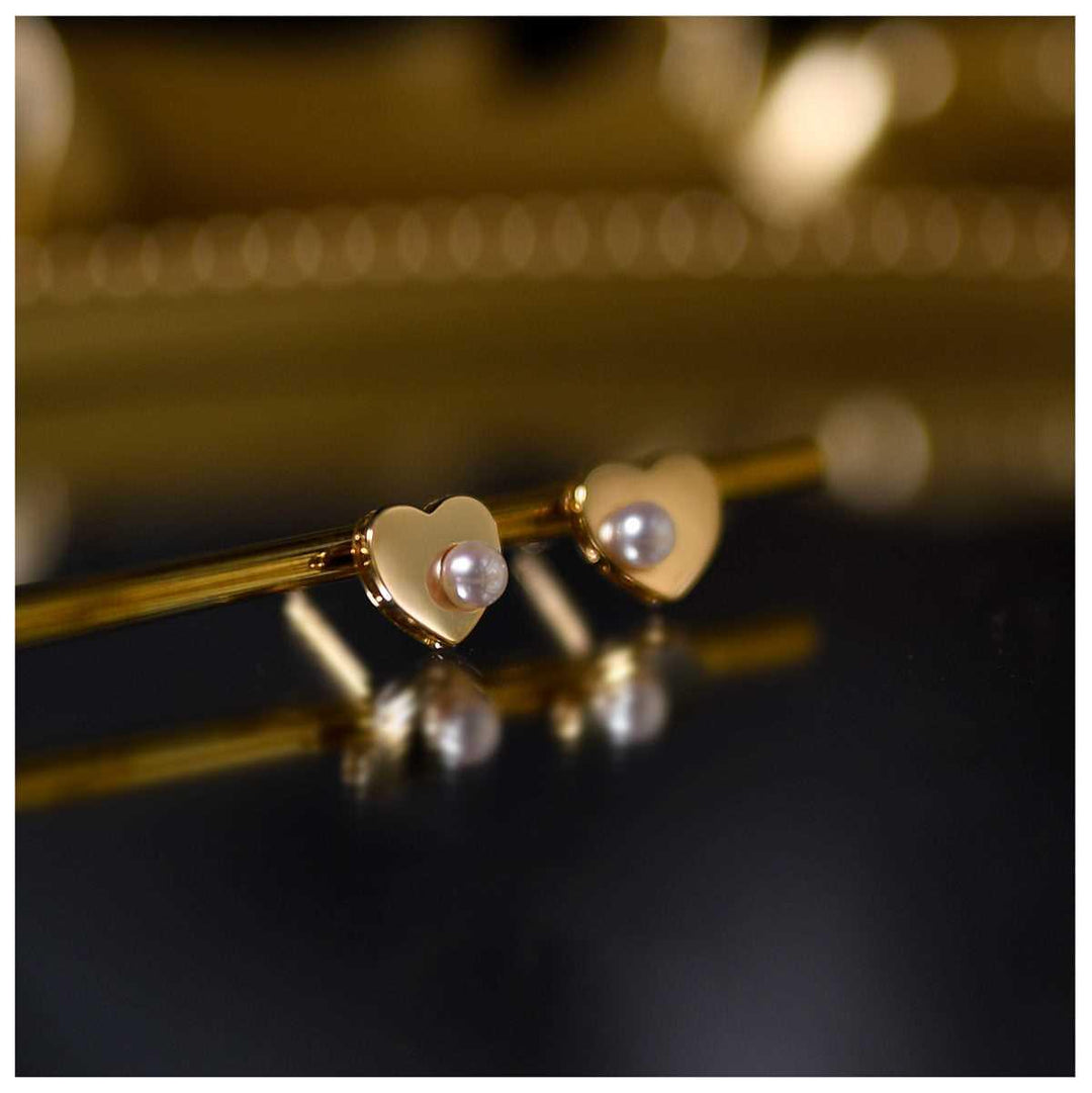 Elegant gold heart pearl stud earrings for women, perfect for a refined gift
