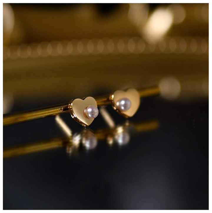 Elegant gold heart pearl stud earrings for women, perfect for a refined gift