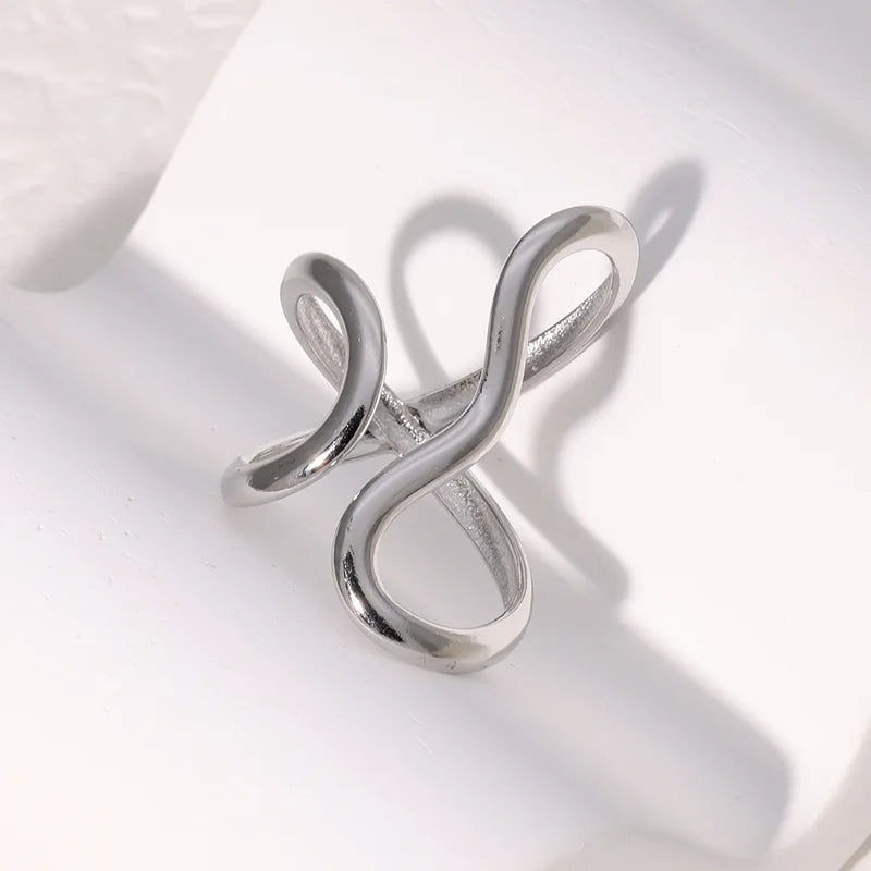 Stylish silver adjustable infinity ring, perfect women's jewelry, tarnish-free & water-resistant for daily wear.
