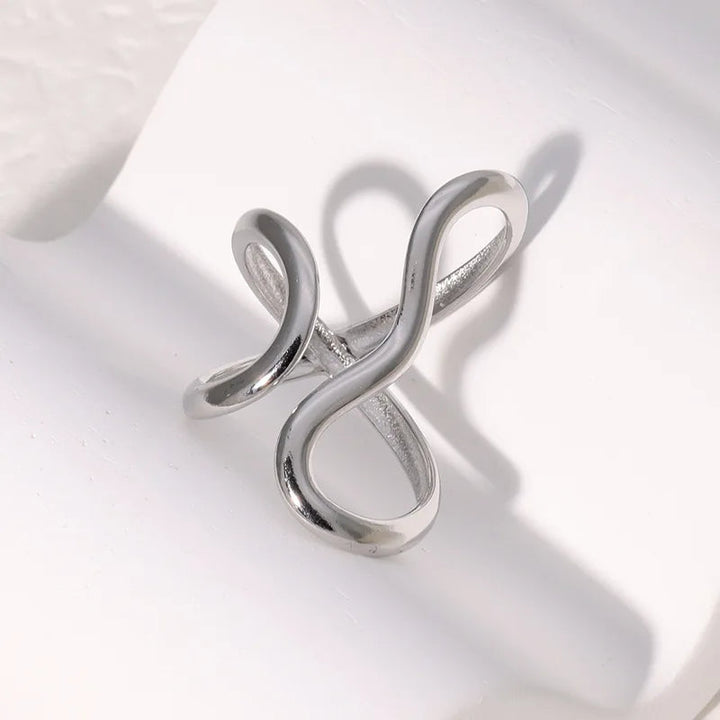 Stylish silver adjustable infinity ring, perfect women's jewelry, tarnish-free & water-resistant for daily wear.