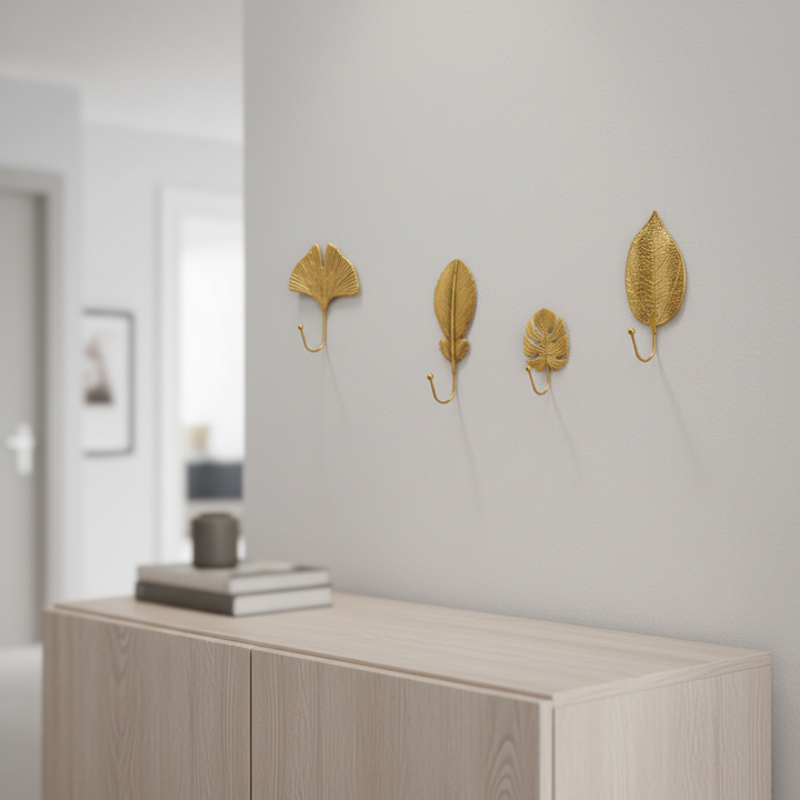 Elegant gold leaf cast iron wall hook, Leafora design, for stylish home organization in an entryway or bathroom.