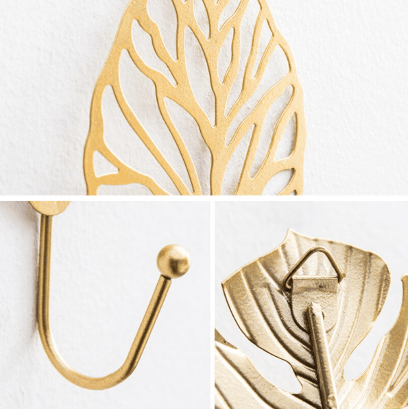 Stylish Leafora gold cast iron wall hook with a botanical leaf design, great for organizing and enhancing home aesthetics.